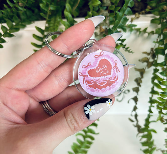 Literally just a girl heart cake keychain