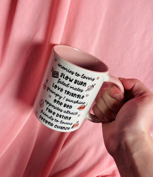 Romance bookish tropes, pink and white mug