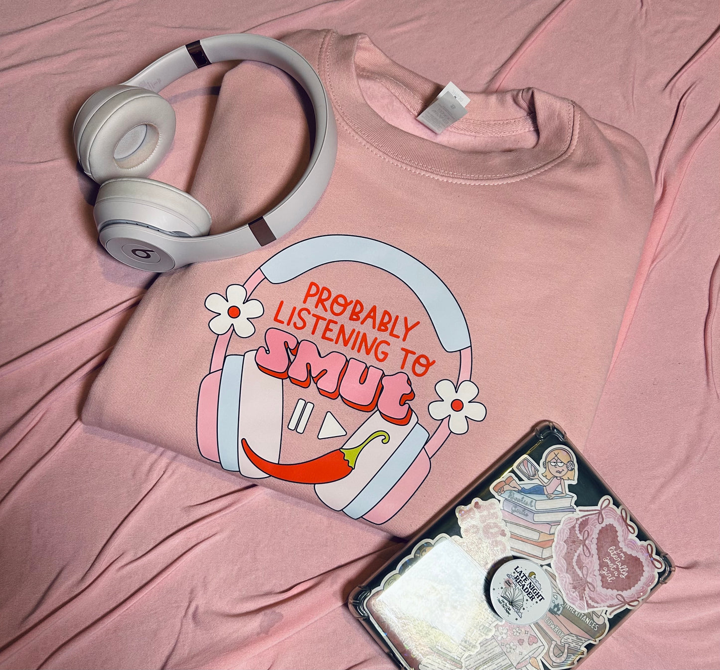 Probably listening to smut sweatshirt