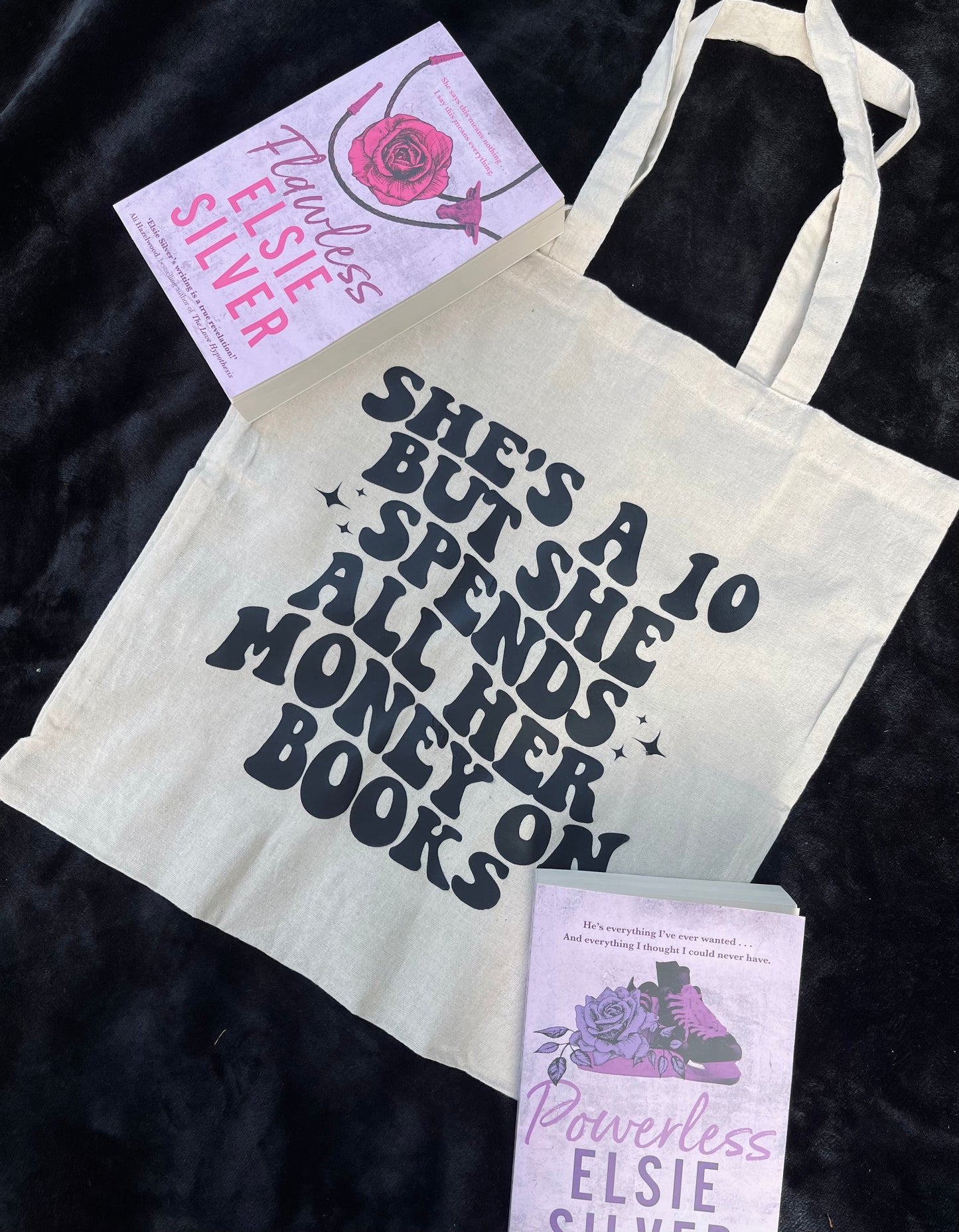 She’s a 10 but she spends all her money on books | Natural cotton tote bag